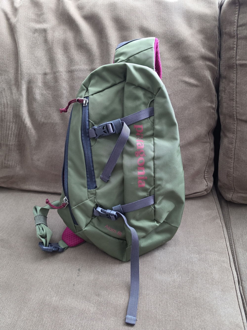 Patagonia Olive Green Sling Backpack with Pink Accents